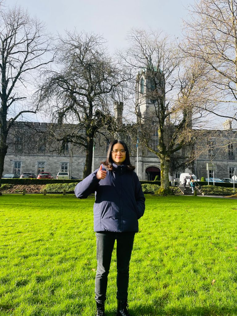 Wanqi in front of the quadrangle building in Galway.